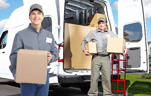 Moving team handling boxes and furniture in Crystal Palace