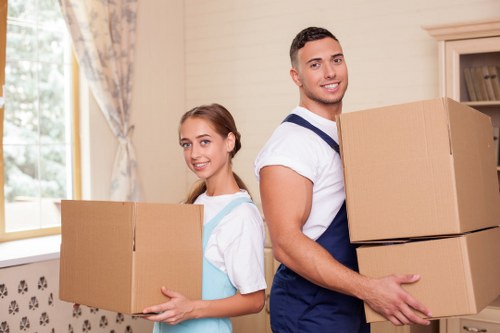 Supervisor carrying out a risk assessment before a home move