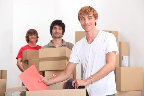 Packed moving boxes and furniture prepared for safe transport