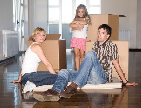 Moving van outside a flat in Crystal Palace with boxes and furniture
